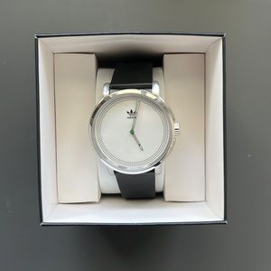 Black Adidas Watch for men and women. One sized and in perfect condition.